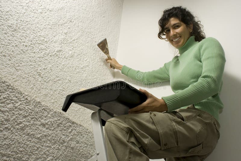 Woman Painting a Wall - Horizontal