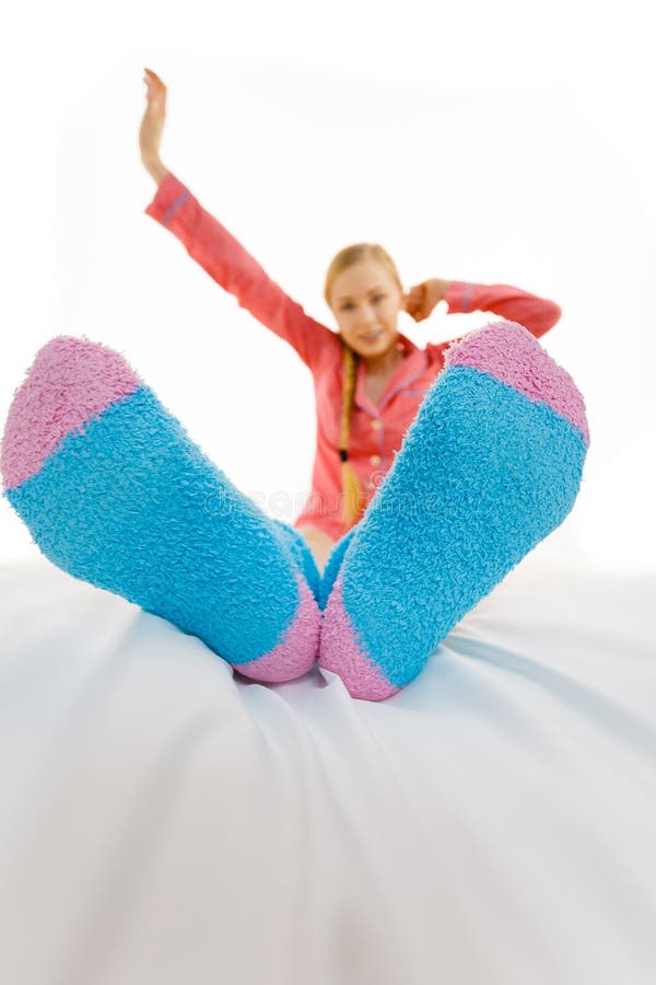 Woman in Pajamas Wearing Furry Warm Socks Stock Image - Image of ...