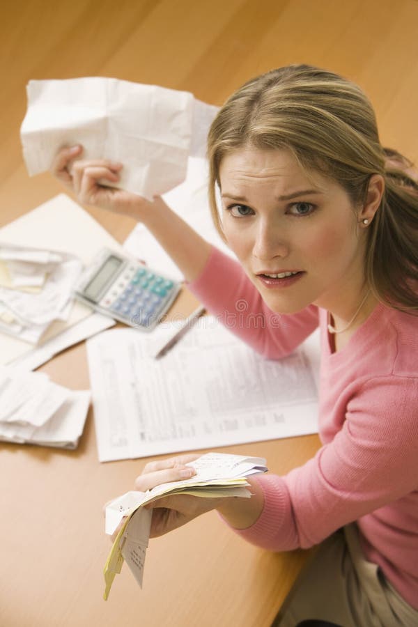 Woman Paying Bills royalty free stock images