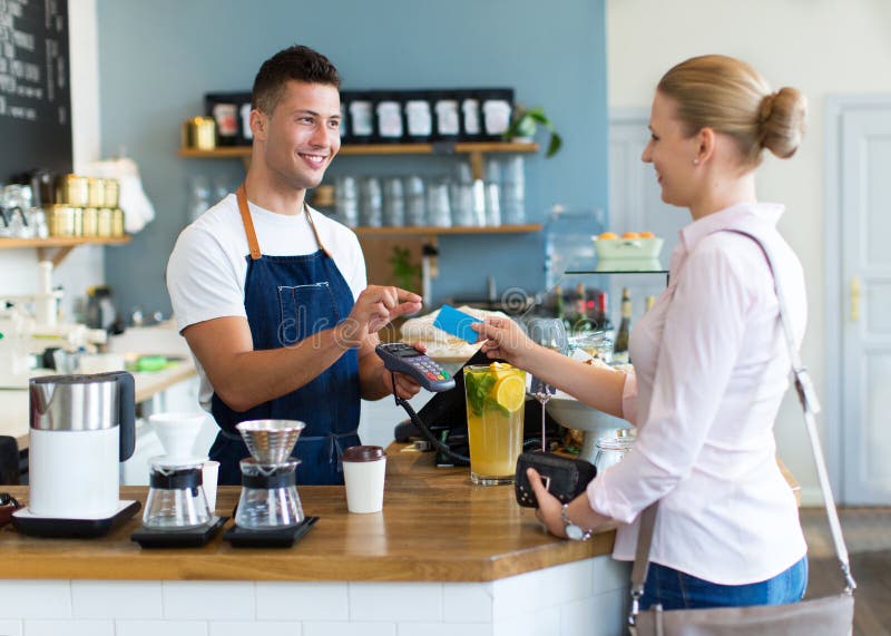Woman paying for coffee stock photo. Image of commerce 60538874