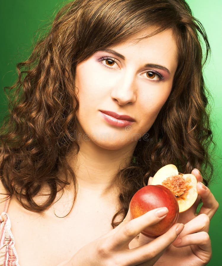Woman with peaches stock image. Image of beauty, health 32686595