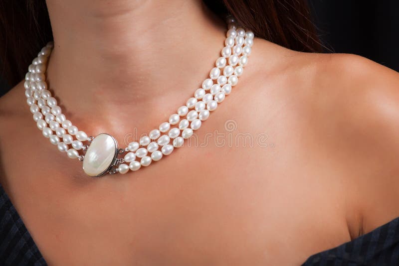 Woman with pearl necklace on her neck stock images Woman with pearl necklace on her neck stock images