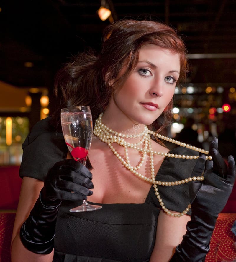 Woman with Pearls and Champagne