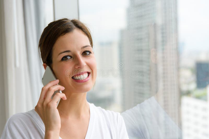 Woman on Phone Call at Home Stock Photo - Image of happy, indoor: 64076088