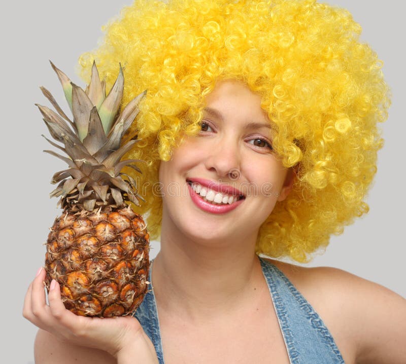 Woman with pineapple stock image. Image of blonde, tropical 18630965