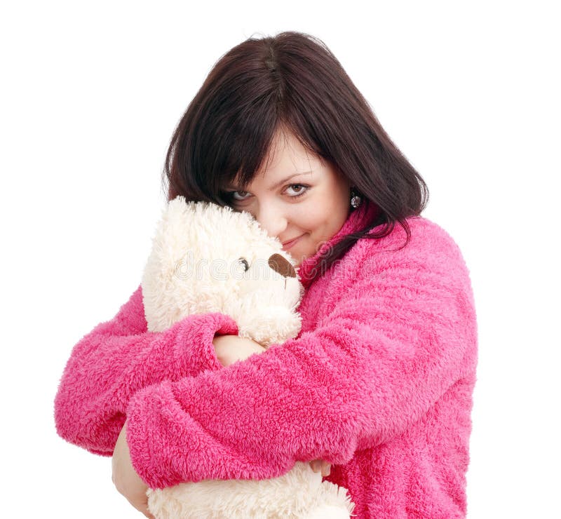 Woman in Pink Bathrobe Cuddling with her Teddy Bear stock photos