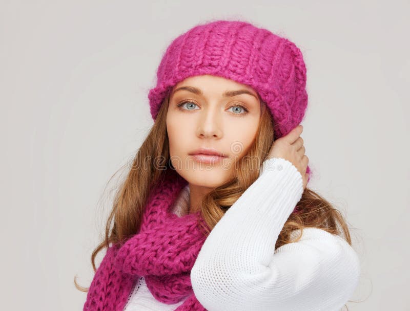 Woman in pink hat and scarf