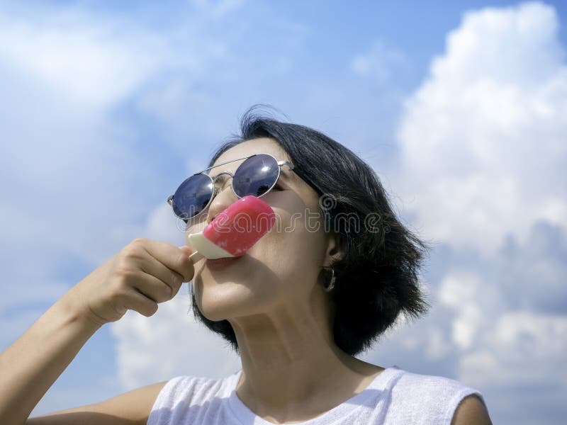 Asian Sucking On A Popsicle