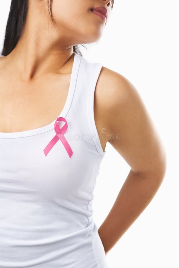 Woman with pink ribbon on her chest