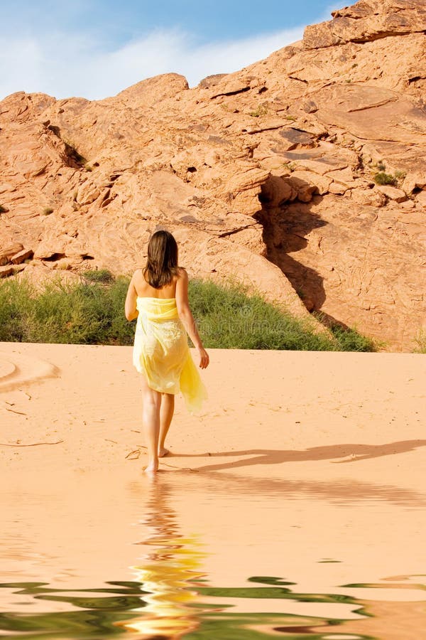 Woman on pink sands