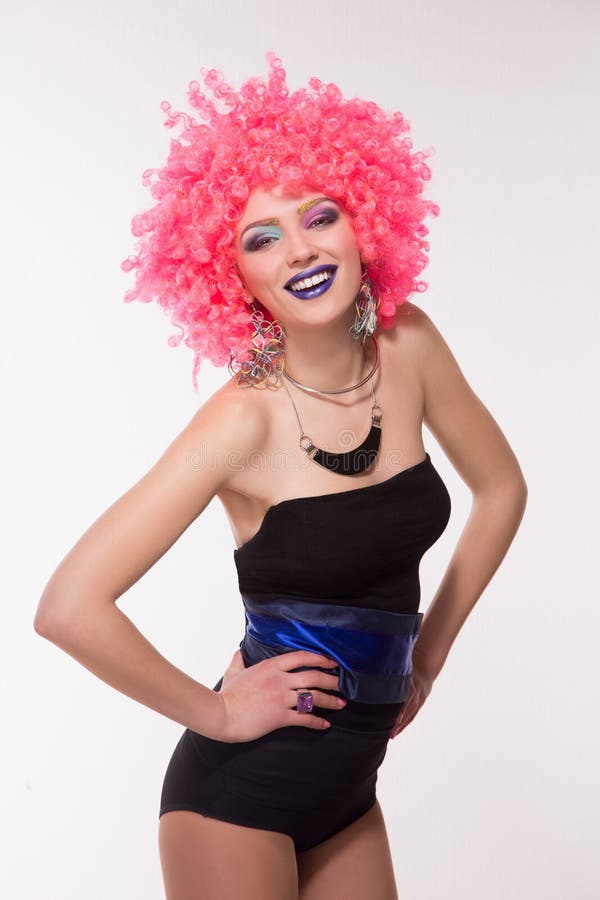 Woman in pink wig with silver ball