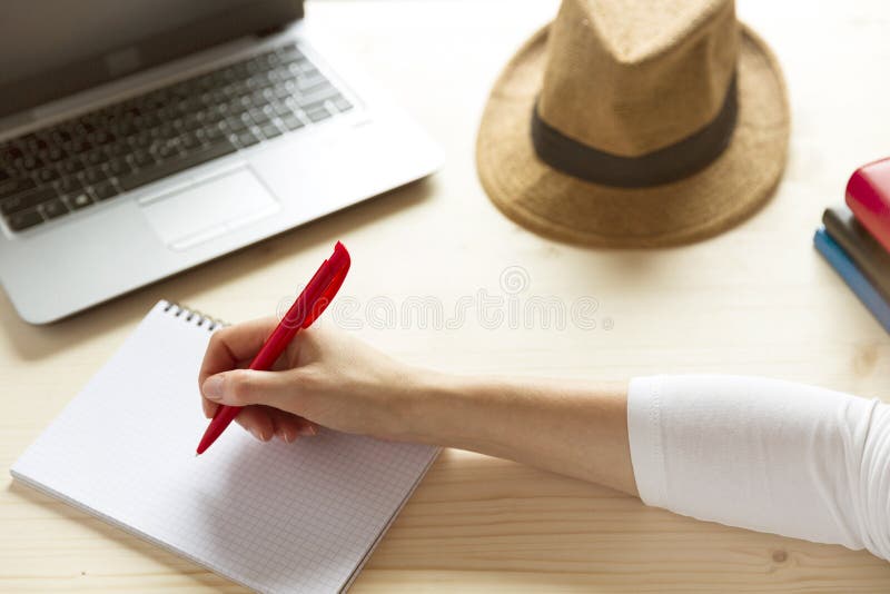 Woman planning vacations online searching information in a laptop while working at home as a freelancer stock images Woman planning vacations online searching information in a laptop while working at home as a freelancer stock images