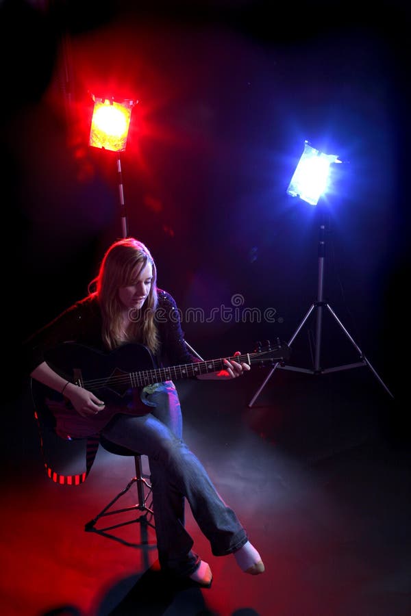 Woman playing guitar