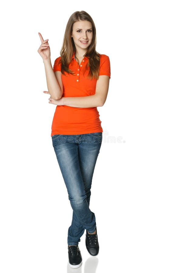 Woman pointing up standing in full length