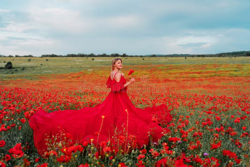 Woman Poppy Field Red Dress. Happy Woman in a Long Red Dress in a ...