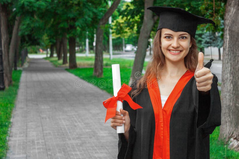 Woman portrait on her graduation day. University. Education, graduation and people concept royalty free stock image Woman portrait on her graduation day. University. Education, graduation and people concept royalty free stock image