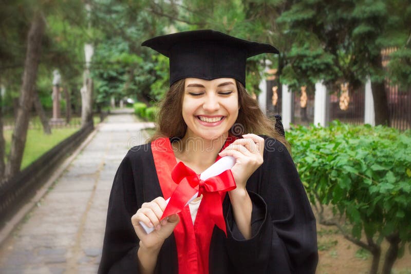 Woman portrait on her graduation day. University. Education, graduation and people concept stock images Woman portrait on her graduation day. University. Education, graduation and people concept stock images