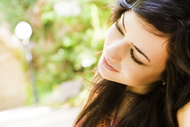 Woman portrait over nature background