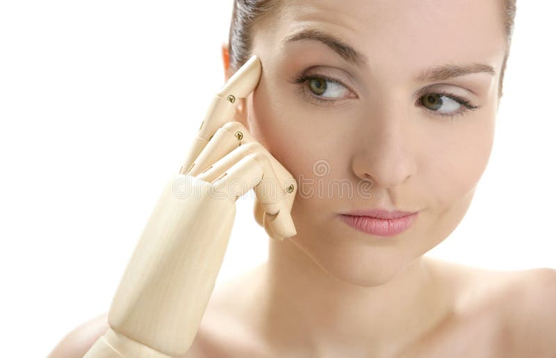 Woman portrait thinking with mannequin hand royalty free stock images