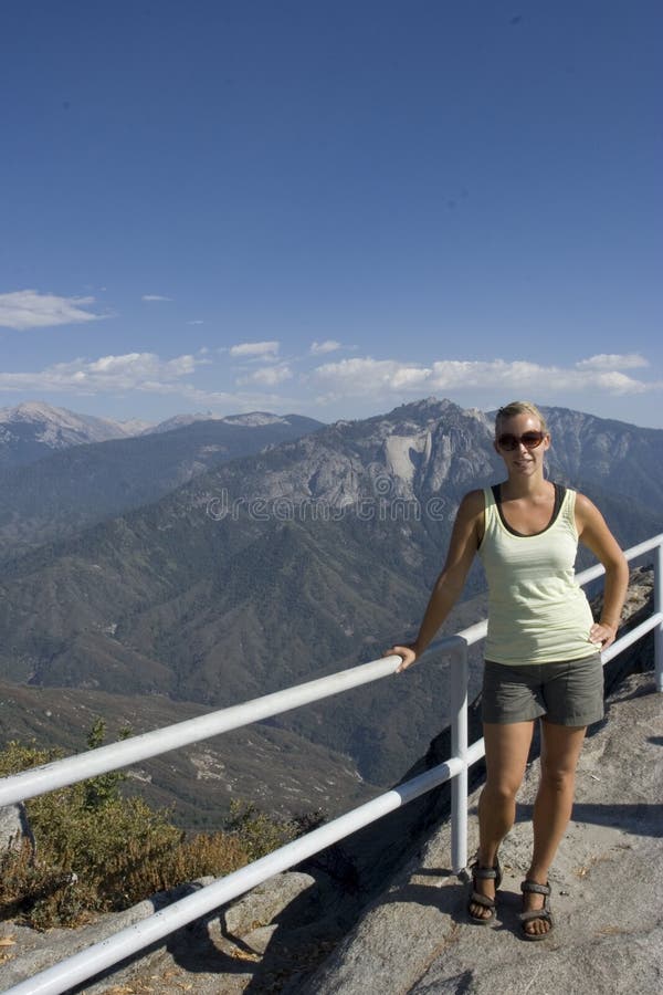 Woman posing on the mountain