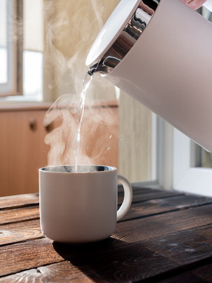 Pouring Boiling Water Into A Tea Cup Stock Image Image of pouring