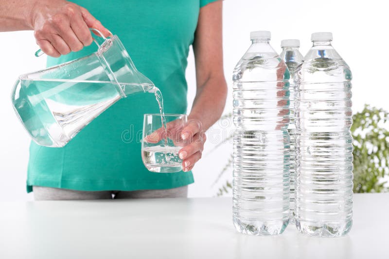 Woman Pouring Water into a Glass Stock Image Image of glass, holding