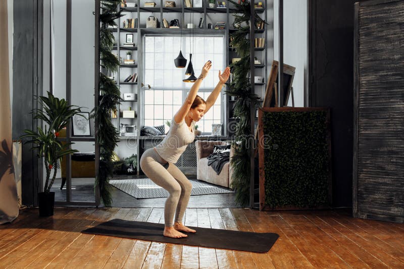 Premium Photo | Triangle pose. trikonasana. sports girl does yoga and  performs asanas on white background. gymnastics, stretching. vertical frame