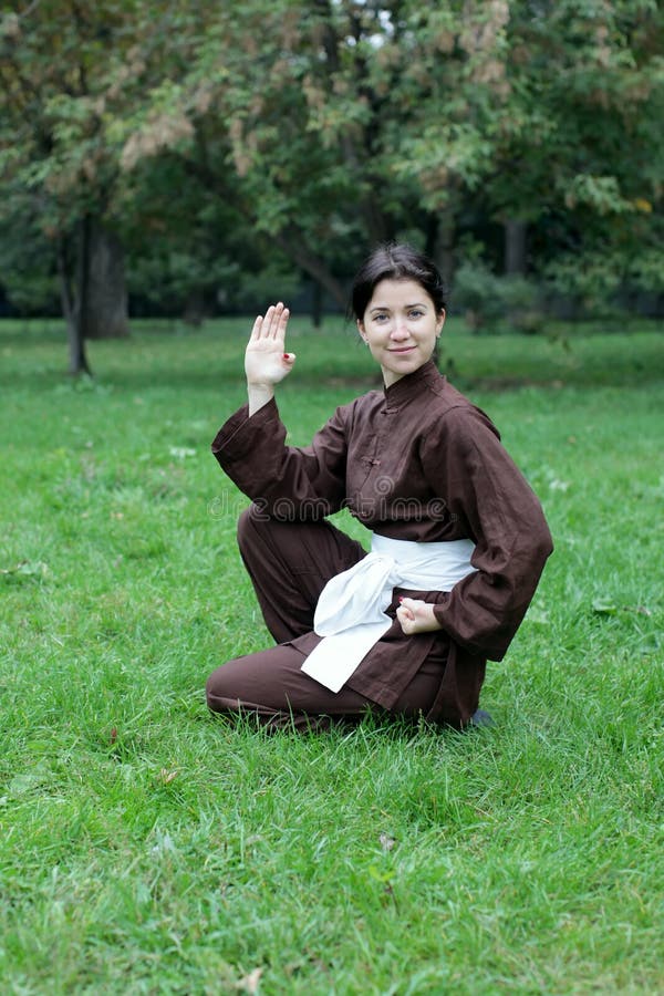 Woman practicing kung fu stock photo. Image of chinese 27042862