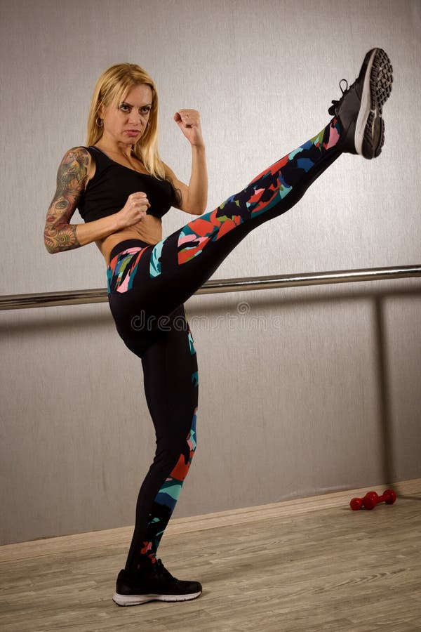 Woman practicing martial arts stock photo Woman practicing martial arts stock photo
