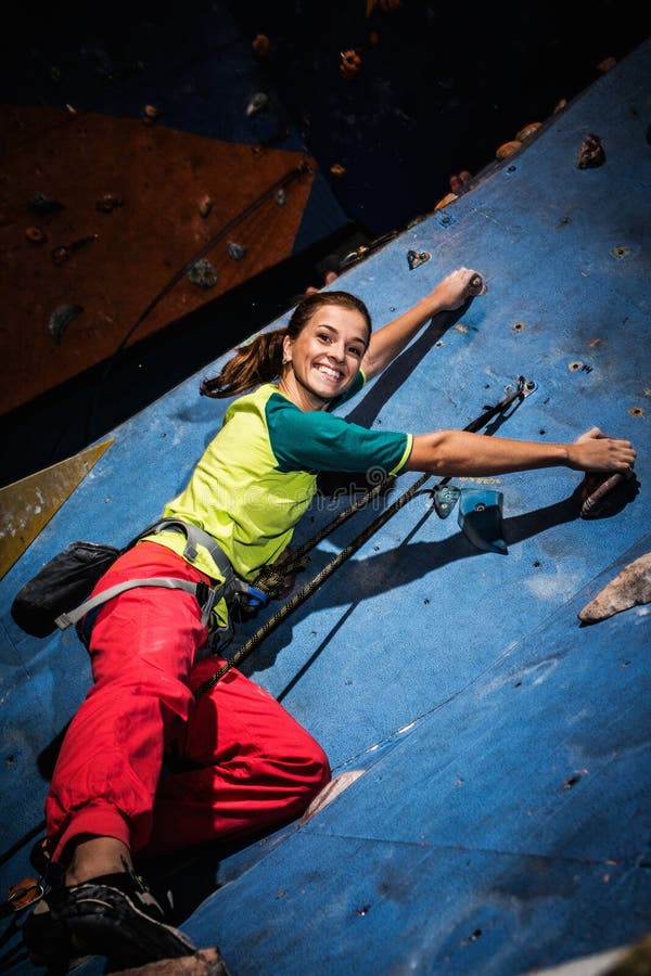 Woman Practicing Rockclimbing on a Rock Wall Stock Image Image of