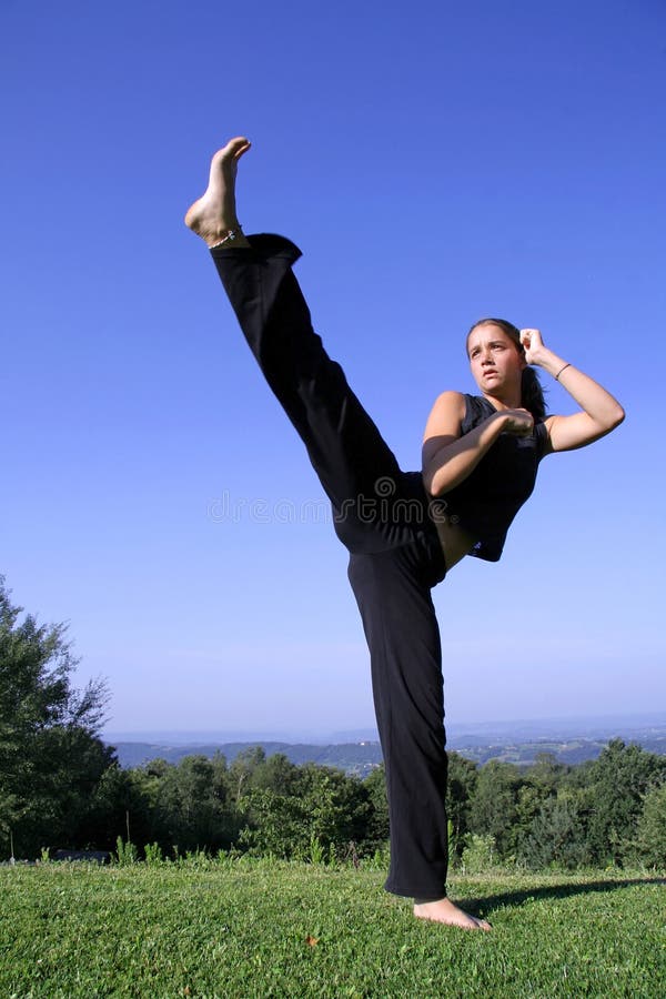 Woman practising self defense