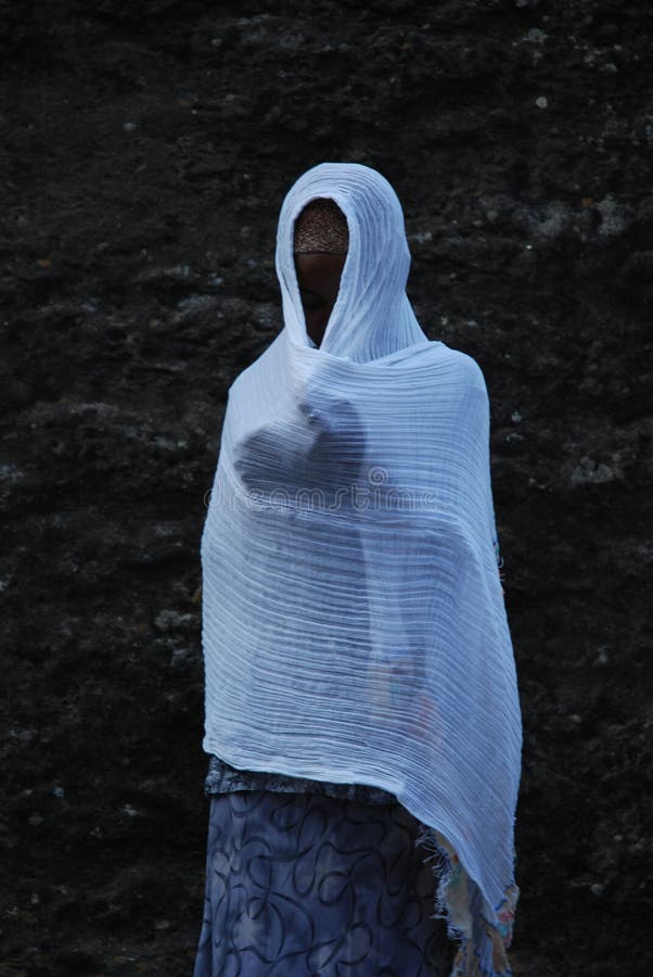 Woman praying, Lalibela, Wollo, Ethiopia royalty free stock photos Woman praying, Lalibela, Wollo, Ethiopia royalty free stock photos