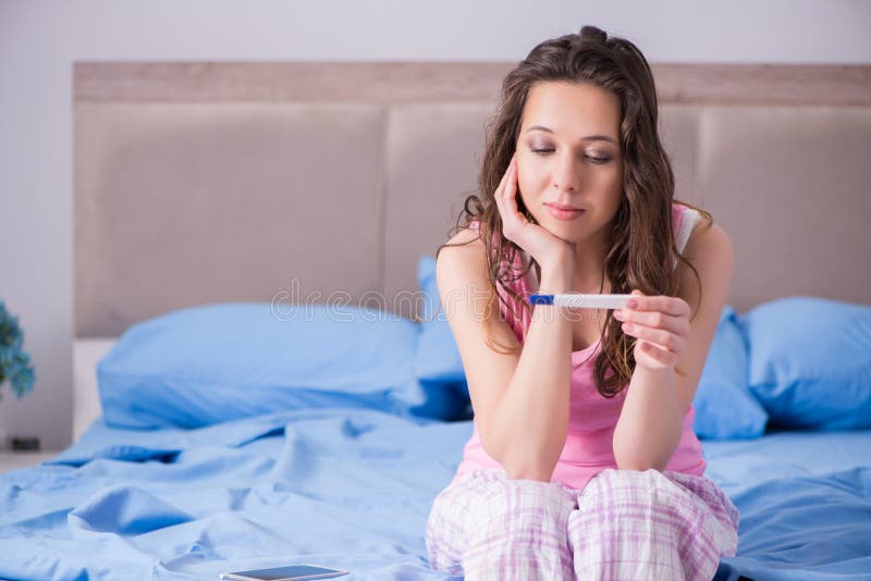 The woman with pregnancy results test royalty free stock photos The woman with pregnancy results test royalty free stock photos