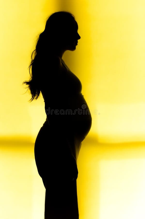 Woman in pregnant silhouette