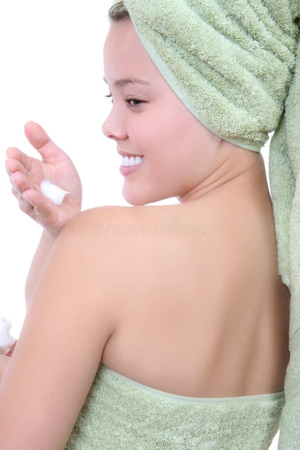 Woman Putting on Lotion stock image. Image of bath, shoulder 7363799