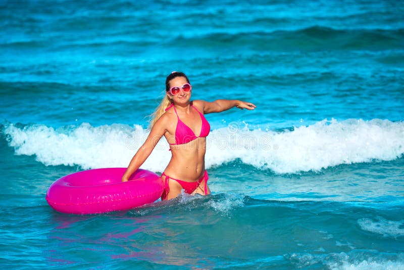 Woman with raft stock photos