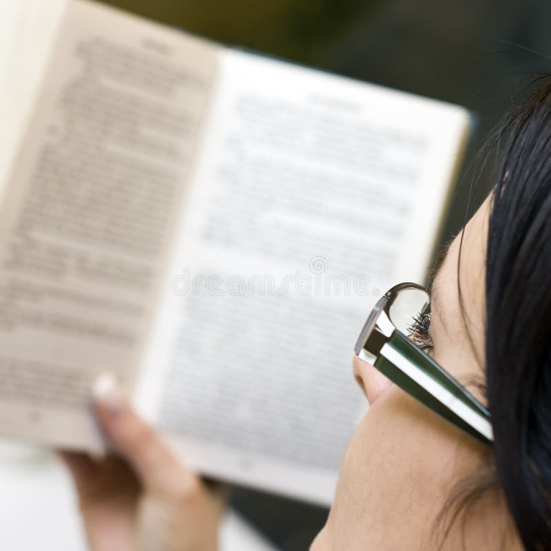 Woman reading a book stock images Woman reading a book stock images