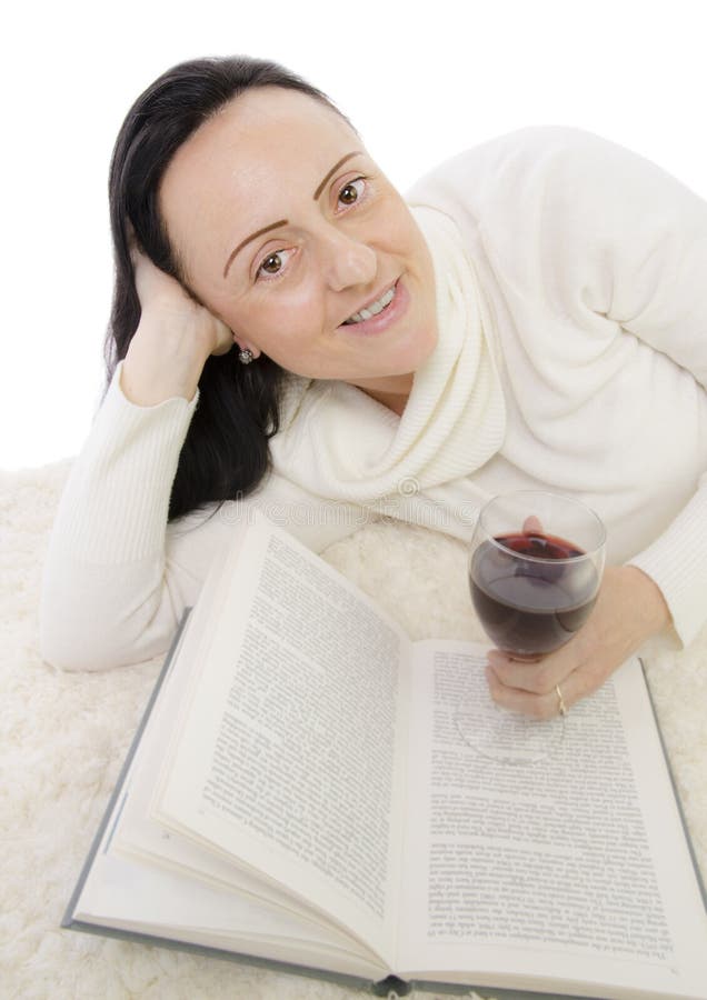 Woman reading book with red wine royalty free stock image Woman reading book with red wine royalty free stock image