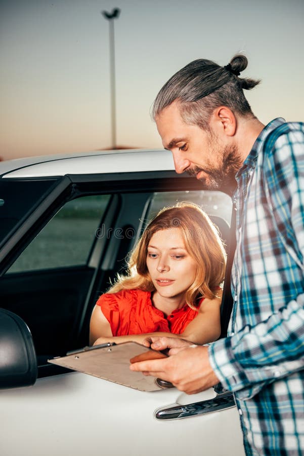 Woman Reading Car Rental Agreement Stock Photo Image of allowance