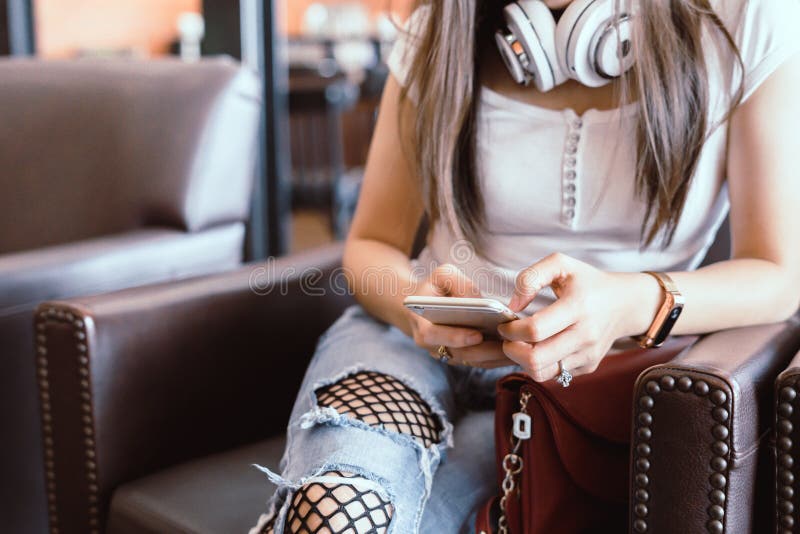 Woman reading good news on mobile phone during rest in coffee sh stock photos Woman reading good news on mobile phone during rest in coffee sh stock photos