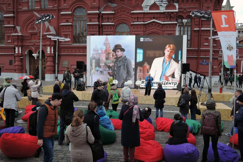 A woman reads poetry of Sergey Esenin