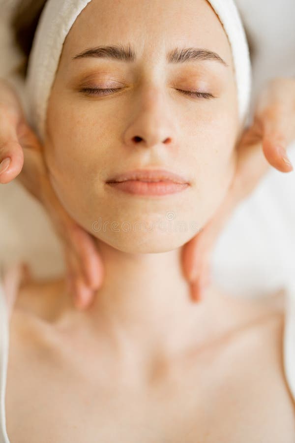 Woman Receiving Relaxing Facial Massage Stock Image Image Of Face Massaging 302015681