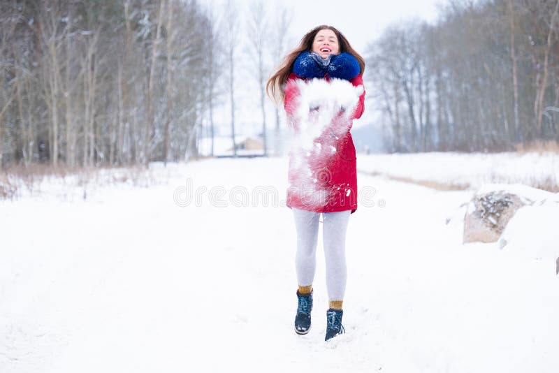 Young Woman in Red Coat Enjoy Snowy Winter Stock Photo - Image of glove ...