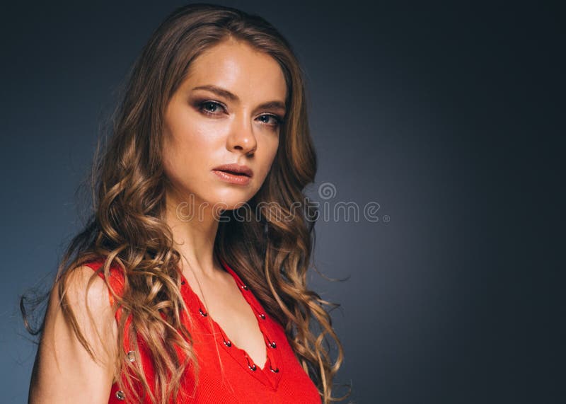 Woman in Red Dress with Long Blonde Hair Stock Photo - Image of black ...