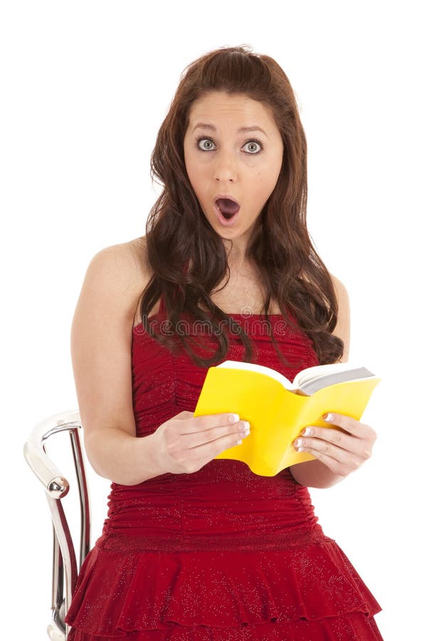 Woman red dress shocked at book