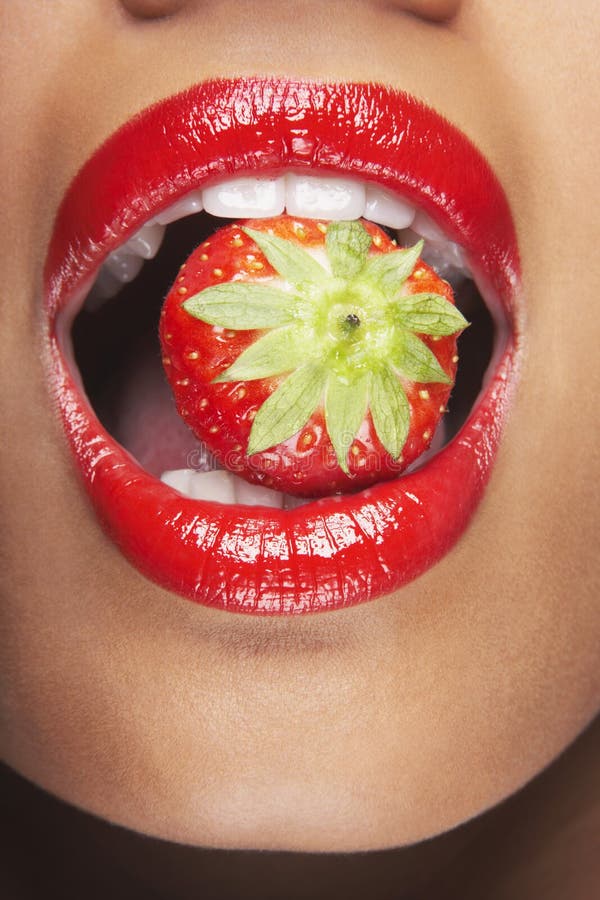 Woman With Red Lips Eating Strawberry Stock Images Image 31838634