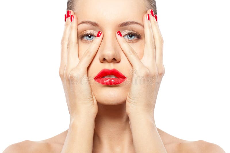 Woman with red nails and lips