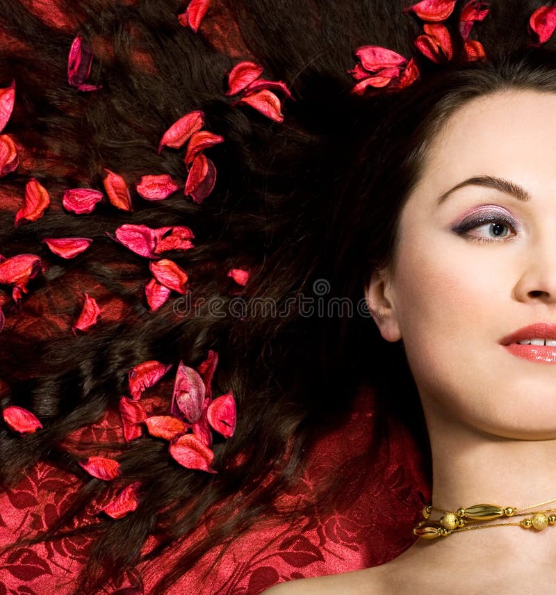 Woman in red petals