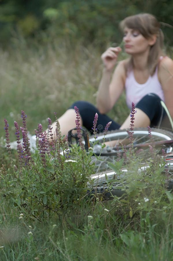 Woman relax bike unfocus