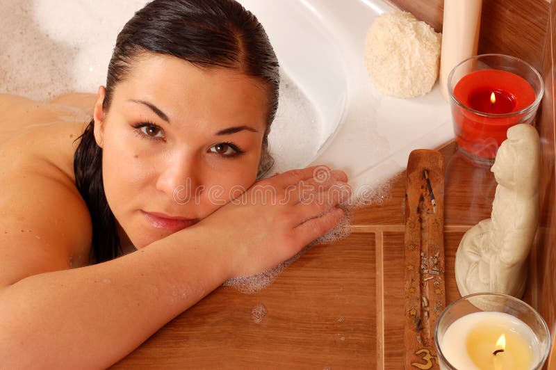 Woman relaxing in bath